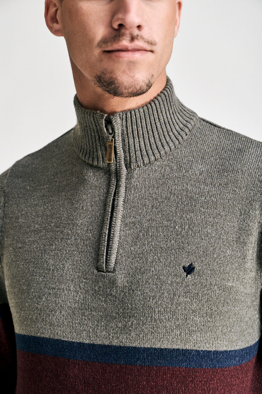Sweater claudin con rayas central